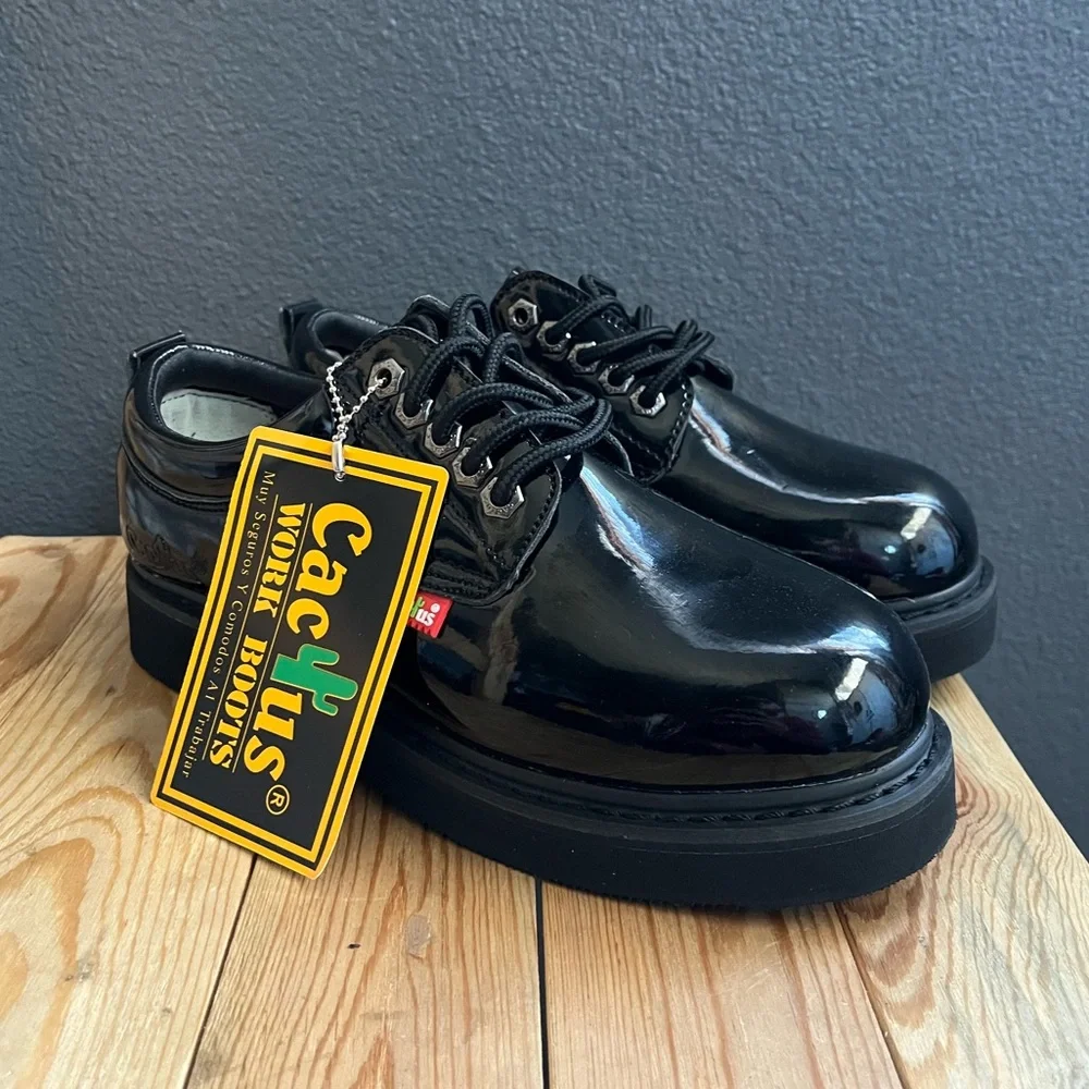 All black leather platform low top laced up boots